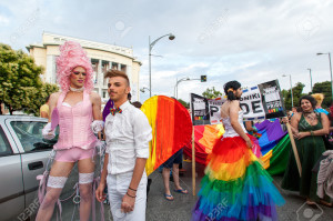 Participants of the Gay Pride parade march through the city of